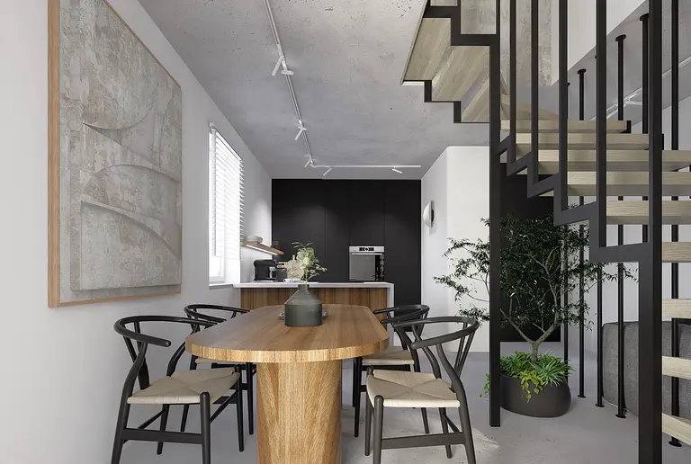 Jadalnia w stylu industrialnym i minimalistycznym z drewnianym stołem i czarnymi detalami.