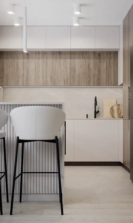Wnętrze kuchni w stylu minimalistycznym z drewnianymi detalami i nowoczesnymi meblami.