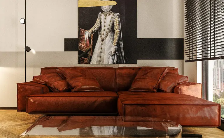 Wnętrze salonu z brązową skórzaną sofą i nowoczesnym stolikiem, minimalistyczny design.