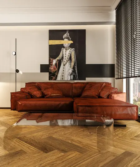 Wnętrze salonu z brązową skórzaną sofą i nowoczesnym stolikiem, minimalistyczny design.