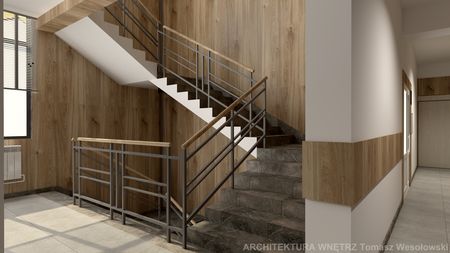 Klatka schodowa z drewnianymi panelami i metalowymi balustradami, współczesny design.