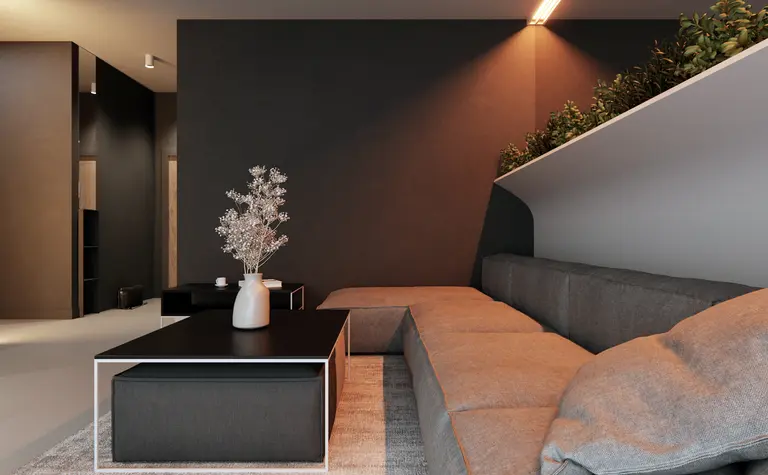 Wnętrze salonu w stylu eklektycznym, minimalistycznym i soft minimalizm z szarymi ścianami.