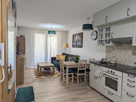 Wnętrze kuchni z elementami art deco, prowansalskimi i skandynawskimi.