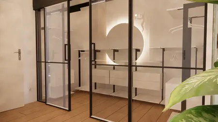 Garderoba z minimalistycznym designem, białe meble, czarne akcenty, styl boho i skandynawski.