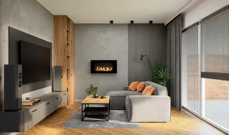 Stylowy salon z szarą sofą, pomarańczowymi poduszkami i ściennym kominkiem. Wnętrze uzupełnia duży telewizor, drewniane akcenty i stolik kawowy, tworząc elegancki i przytulny wystrój.