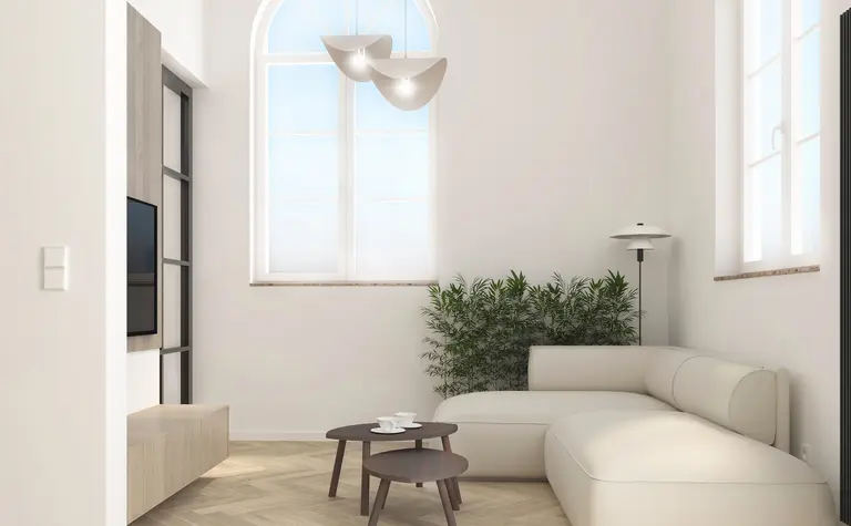 Wnętrze salonu w stylu japandi i minimalistycznym z jasnymi meblami.