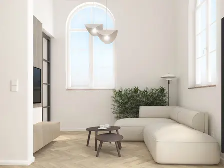 Wnętrze salonu w stylu japandi i minimalistycznym z jasnymi meblami.