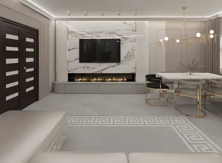 Wnętrze salonu z kominkiem, jasnymi meblami i detalami glamour.