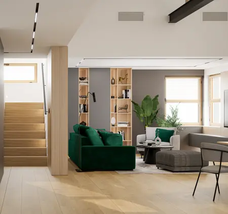 Wnętrze salonu z zieloną sofą, drewnianymi meblami, minimalistycznym designem.