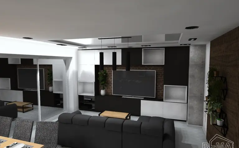 Wnętrze salonu w stylu industrialnym i skandynawskim z czarną sofą i białymi akcentami.
