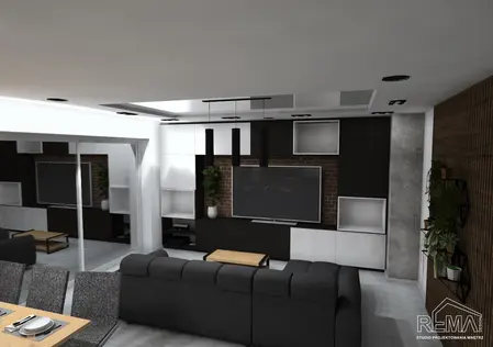 Wnętrze salonu w stylu industrialnym i skandynawskim z czarną sofą i białymi akcentami.