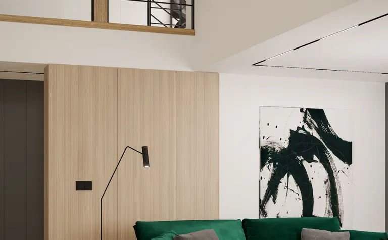 Wnętrze salonu z minimalistycznym designem, zielona sofa, drewniane elementy.