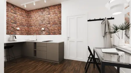 Kuchnia w stylu industrialnym i vintage z ceglaną ścianą i nowoczesnymi meblami.