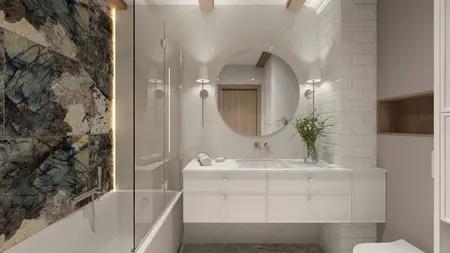 Wnętrze łazienki z białą ceramiką, drewnianymi detalami oraz eleganckim lustrem.