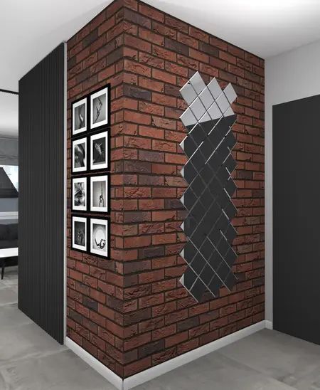 Korytarz z ceglanym murem, lustrami i zdjęciami w stylu art deco, industrialnym i minimalistycznym.