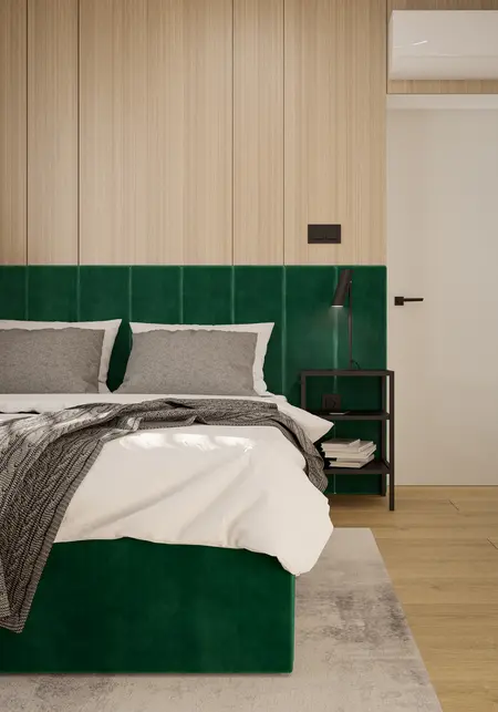 Sypialnia z zielonym wezgłowiem, drewnianymi panelami i minimalistycznym designem.
