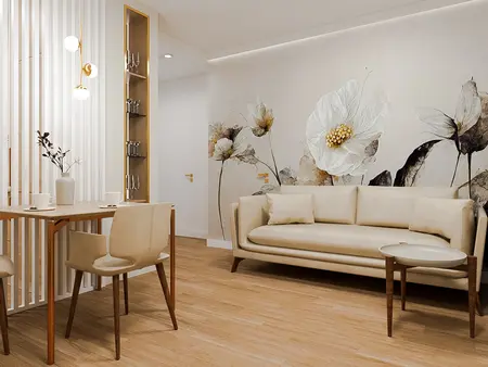 Wnętrze z beżową sofą i kwiatowym muralem, styl quiet luxury.