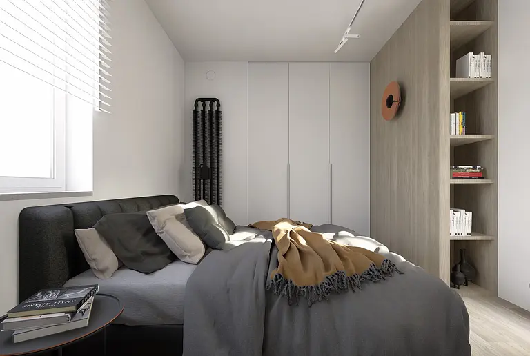 Sypialnia w stylu industrialnym i minimalistycznym z szarym łóżkiem i drewnianymi akcentami.