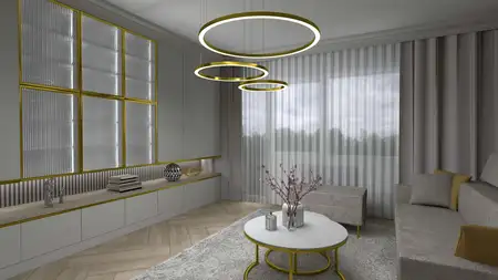 Wnętrze salonu glamour z szarymi meblami i złotymi detalami.