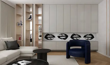 Wnętrze salonu w stylu art deco z niebieskim fotelem i szarymi meblami.