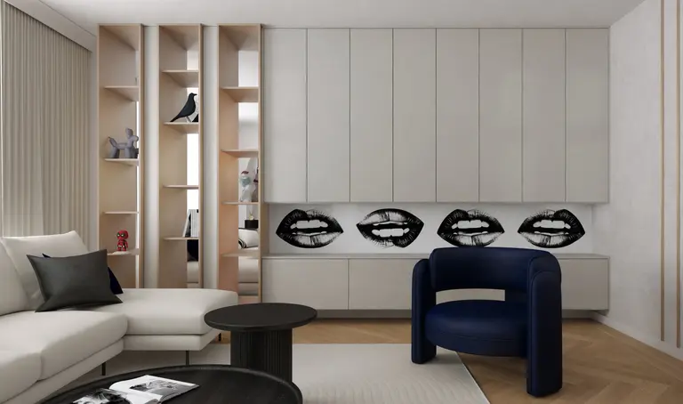 Wnętrze salonu w stylu art deco z niebieskim fotelem i szarymi meblami.