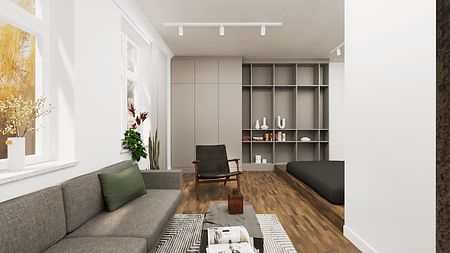 Wnętrze salonu w stylu industrialnym i vintage z szarym narożnikiem i drewnianą podłogą.