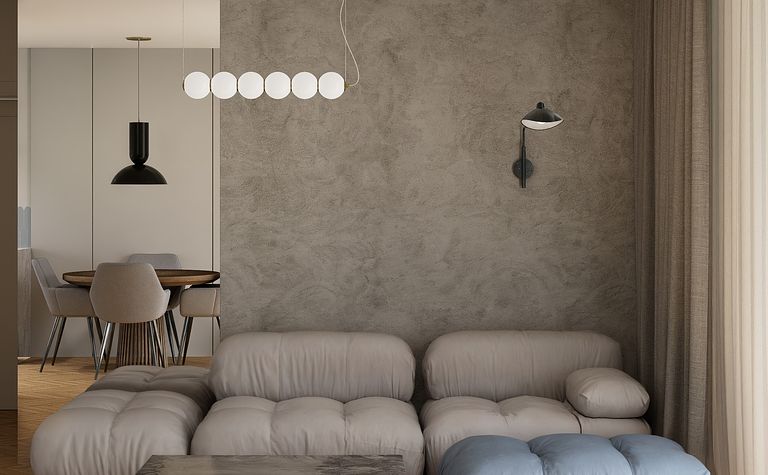 Wnętrze w stylu art deco i eklektycznym z szarymi ścianami, beżową sofą i drewnianym stołem.