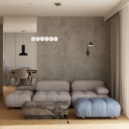 Wnętrze w stylu art deco i eklektycznym z szarymi ścianami, beżową sofą i drewnianym stołem.