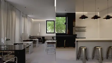 Wnętrze kuchni w stylu minimalistycznym z dużymi oknami, czarnymi akcentami i jasnym blatem.