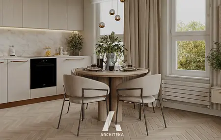 Wnętrze kuchni w stylu minimalistycznym i soft minimalizm z okrągłym stołem.