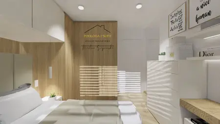Wnętrze sypialni z minimalistycznym designem, białe meble i drewniane akcenty.