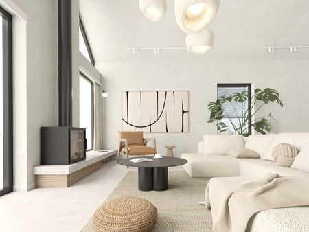 Wnętrze salonu w stylu japandi, minimalistycznym z beżową sofą i roślinami.