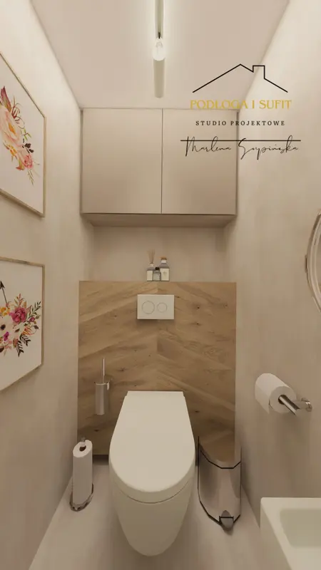 Toaleta z minimalistycznym wystrojem, drewnianymi akcentami i białymi meblami.