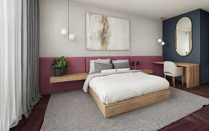 Sypialnia w stylu art deco z drewnianym łóżkiem, różowymi ścianami i nowoczesnym biurkiem.