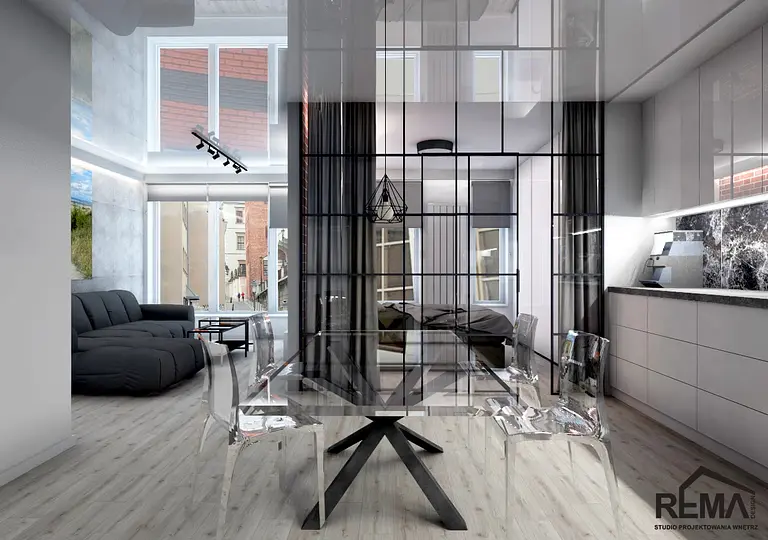Wnętrze nowoczesne z industrialnymi akcentami, przezroczysty stół i czarna sofa.