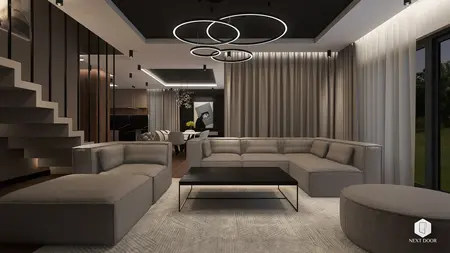 Wnętrze salonu z szaro-beżową sofą, czarnym stolikiem i zasłonami, styl quiet luxury.