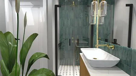 Wnętrze łazienki z zieloną ceramiką, białą umywalką i rośliną, styl quiet luxury.