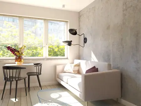 Wnętrze salonu w stylu soft minimalizm z vintage akcentami i współczesnym wystrojem.