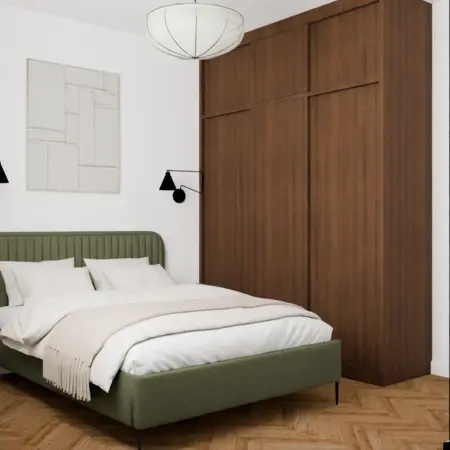 Sypialnia w stylu vintage z zielonym łóżkiem i brązową szafą.
