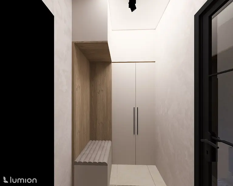 Minimalistyczny przedpokój z białymi meblami i drewnianymi detalami.
