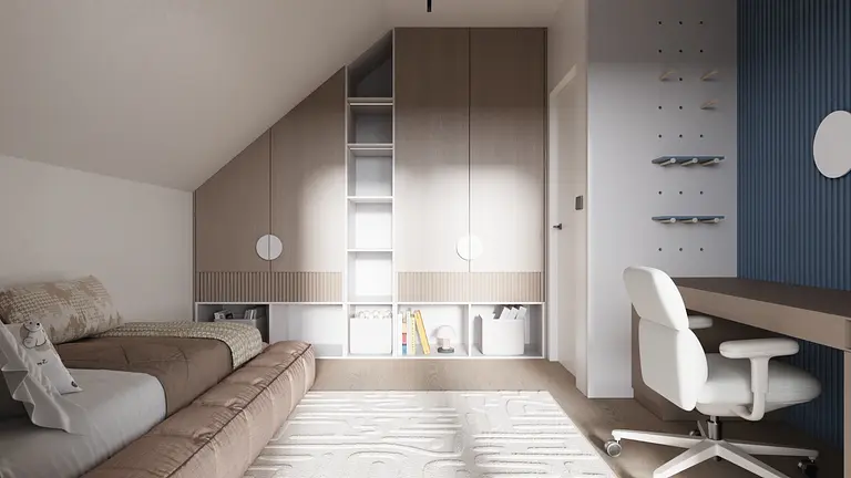 Wnętrze poddasza z minimalistyczną szafą i biurkiem