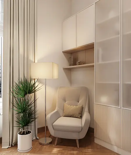 Wnętrze w stylu art deco z jasnym fotelem, rośliną i lampą.