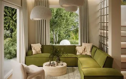Wnętrze salonu w stylu boho i eklektycznym z zieloną sofą.
