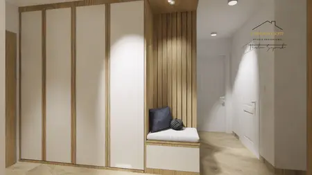 Przedpokój z minimalistycznymi meblami i drewnianymi akcentami.