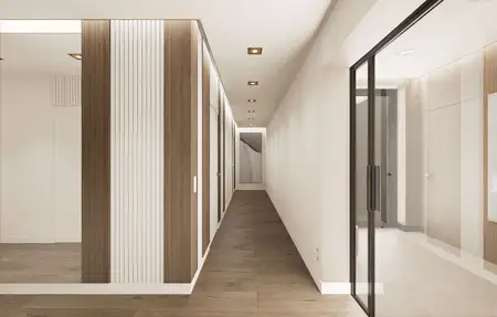 Korytarz w stylu minimalistycznym z drewnianymi akcentami i nowoczesnym oświetleniem