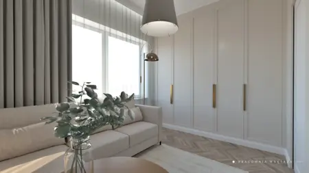Wnętrze salonu w stylu boho, japandi i minimalistycznym z beżową sofą i roślinnością.
