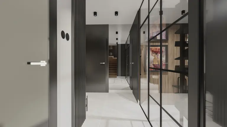 Korytarz w stylu industrialnym z czarnymi elementami i szklanymi ściankami