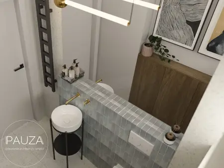 Nowoczesna łazienka z niebieskimi kafelkami, drewnianym blatem i rośliną.
