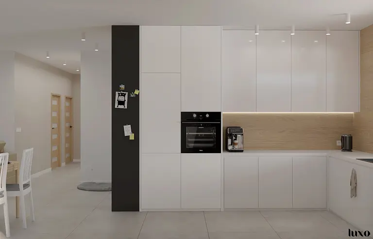 Kuchnia w stylu japandi, minimalistycznym i nowoczesnym z białymi meblami.