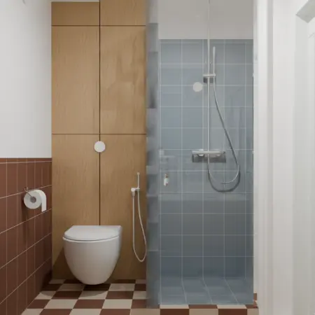 Wnętrze łazienki w stylu vintage z brązowymi płytkami i niebieską kabiną prysznicową.